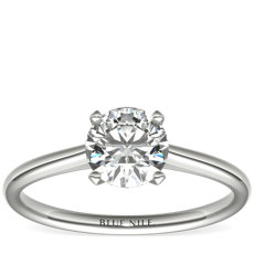 Petite Nouveau Four Prong Solitaire Engagement Ring in Platinum